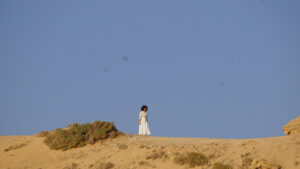 Visitors on guided tour in Timlalin dunes Morocco experience
